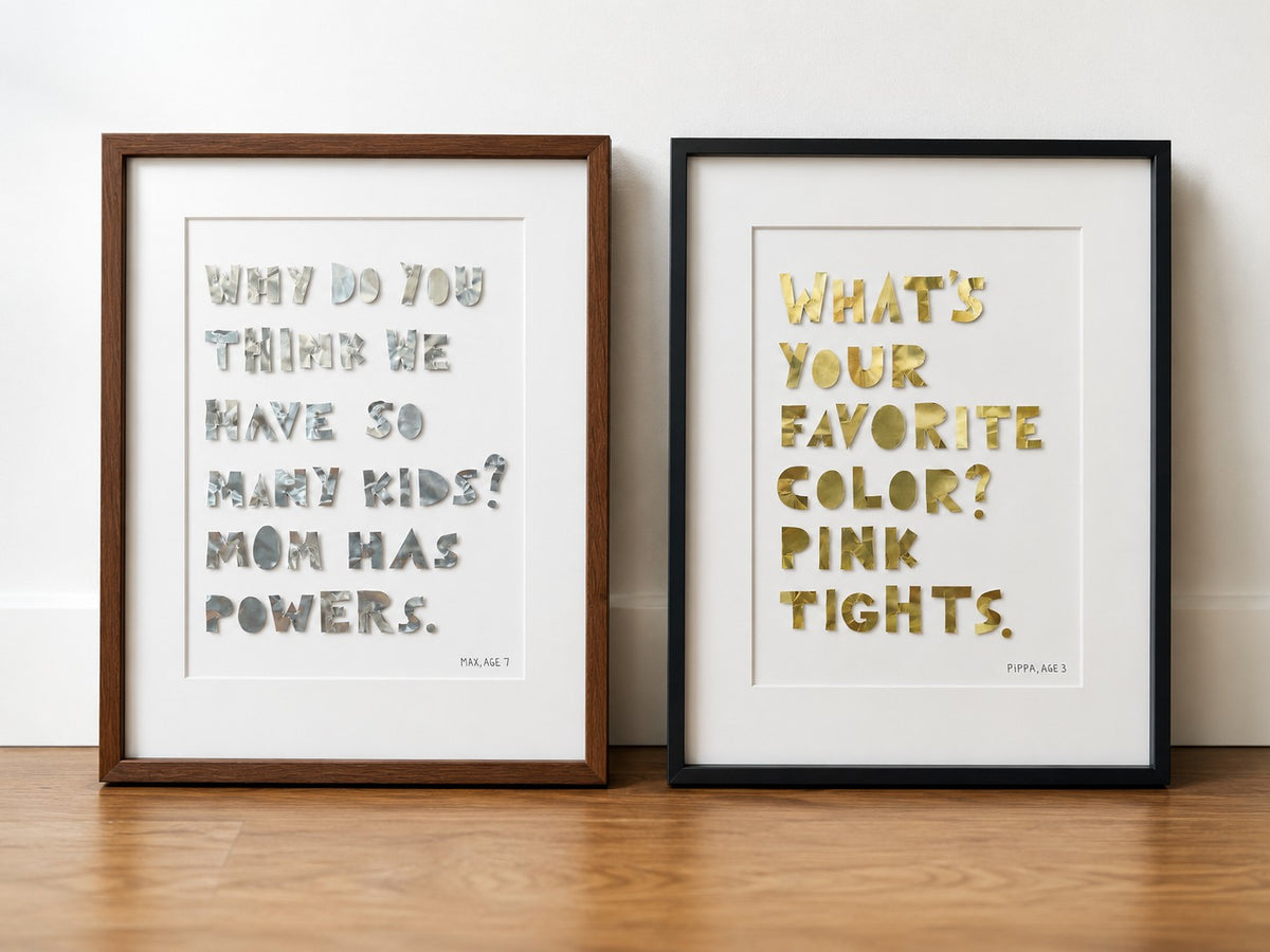 Two quote pieces side by side in brown oak and black metal frames