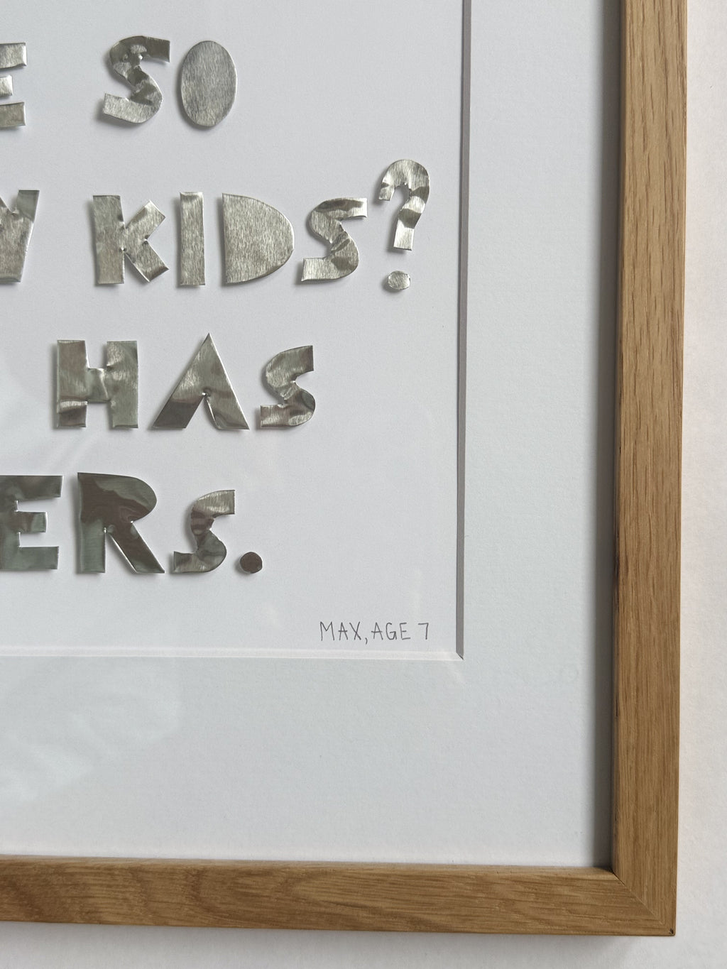 Corner detail of a quote piece showing the signature line: Max, age 7