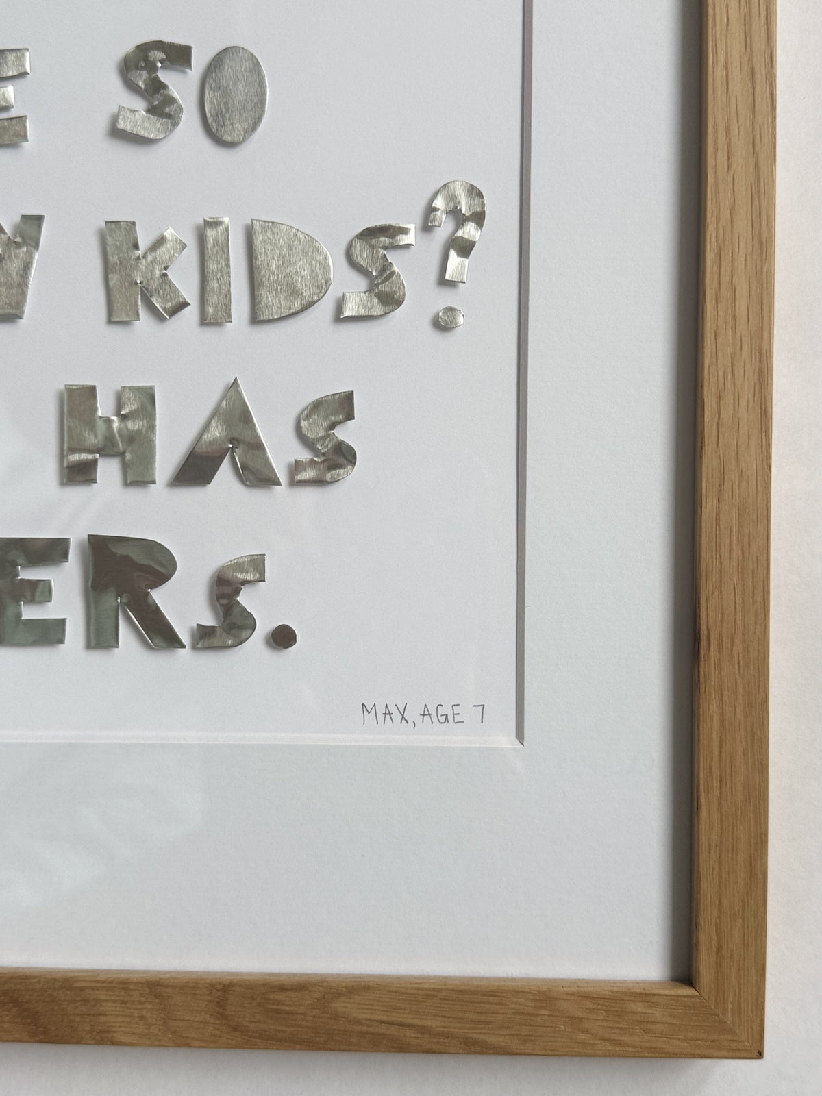 Corner detail of a quote piece showing the signature line: Max, age 7